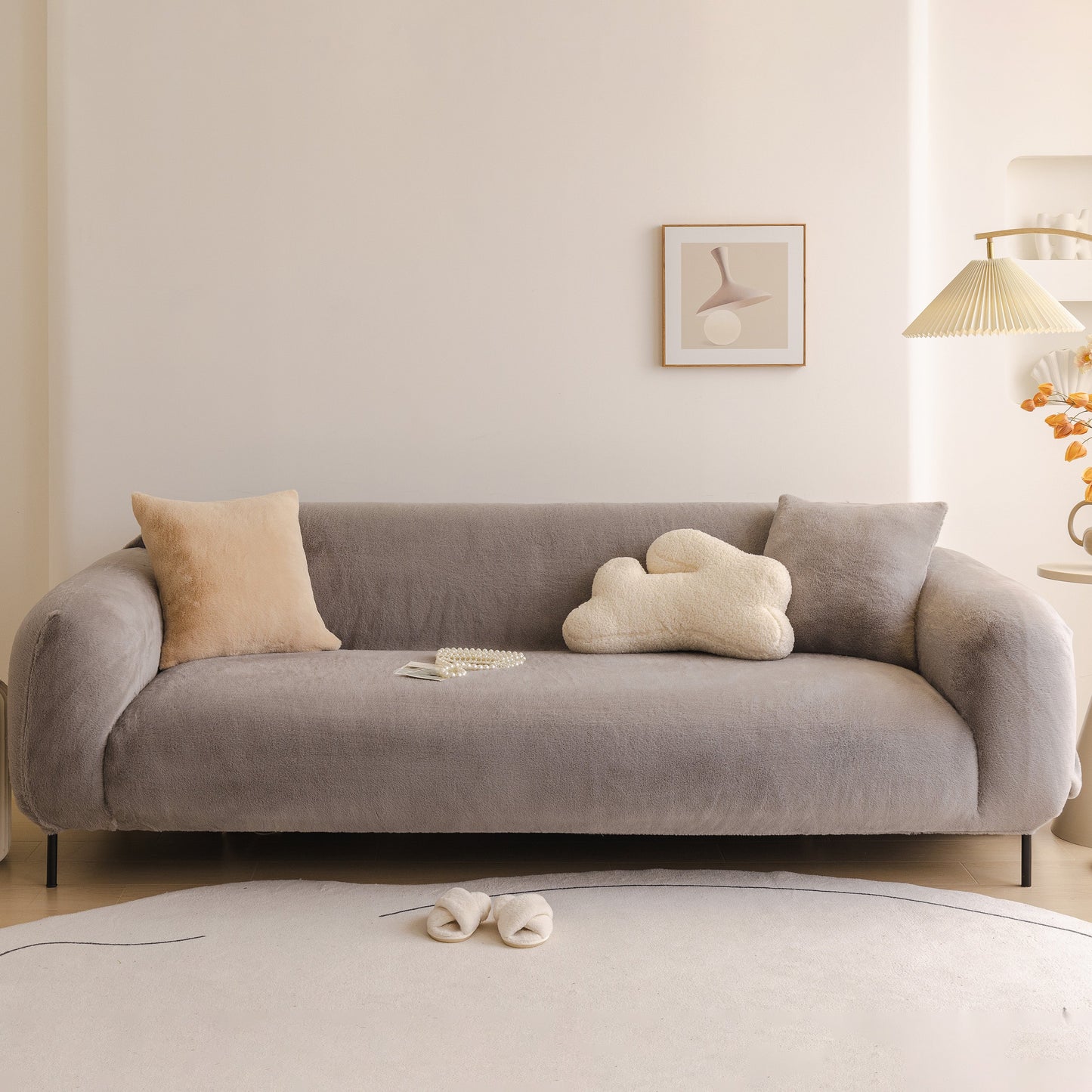 Soft Plush Warm Sofa Cover Stretchable Cozy Velvet Couch Protector for Fall & Winter on a comfortable gray sofa in a stylish room.