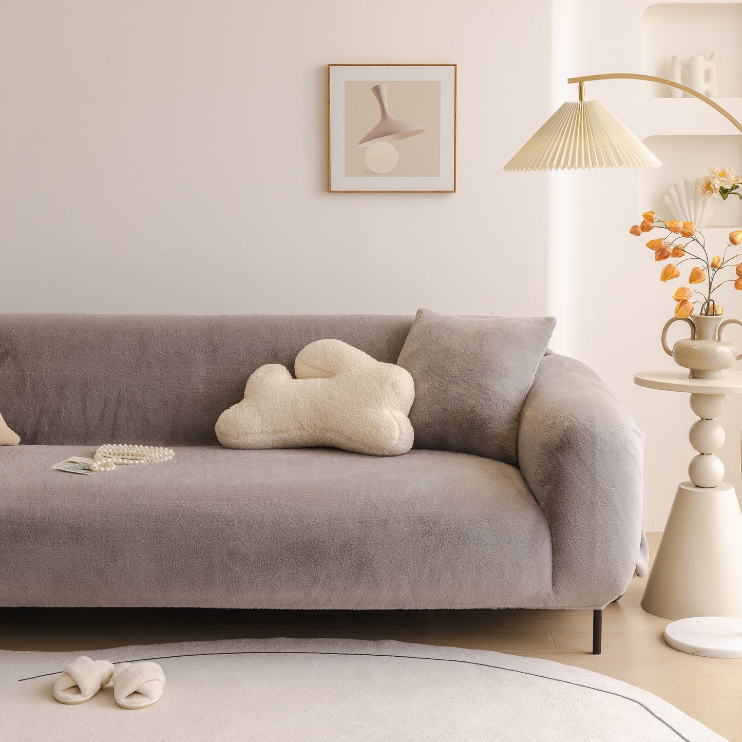 Soft Plush Warm Sofa Cover Stretchable Cozy Velvet Couch Protector for Fall & Winter on a gray sofa in a cozy living room.