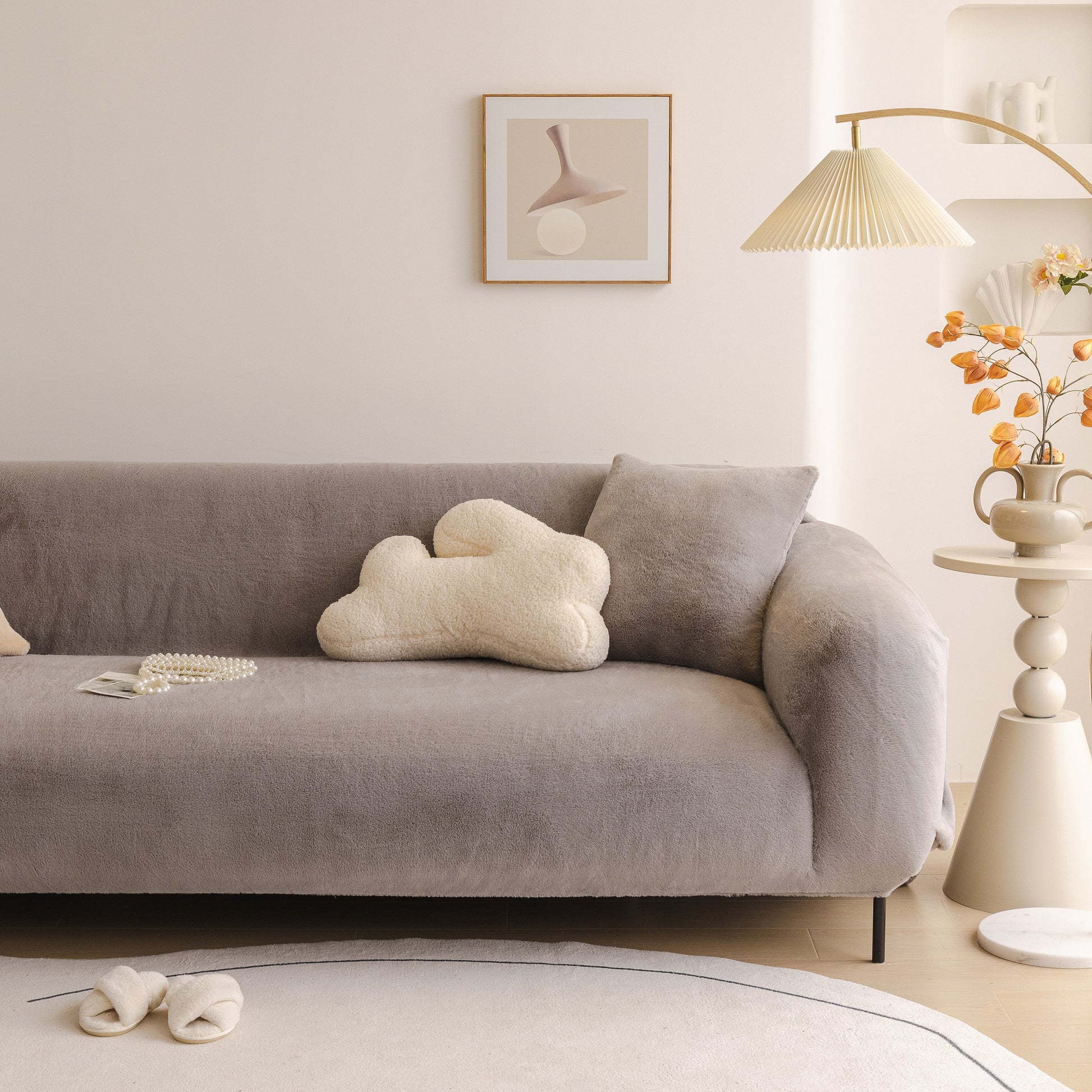 Soft Plush Warm Sofa Cover Stretchable Cozy Velvet Couch Protector for Fall & Winter on a gray sofa in a cozy living room.