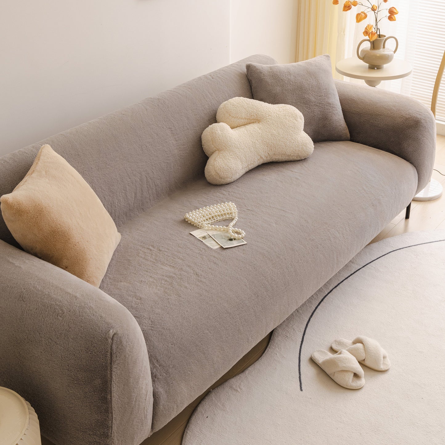 Soft Plush Warm Sofa Cover Stretchable Cozy Velvet Couch Protector for Fall & Winter displayed on a modern sofa