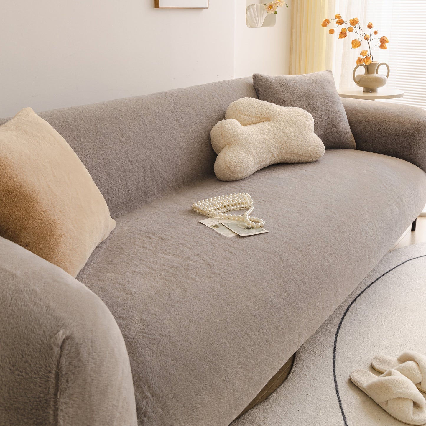 Soft Plush Warm Sofa Cover Stretchable Cozy Velvet Couch Protector for Fall & Winter on a grey sofa with cushions