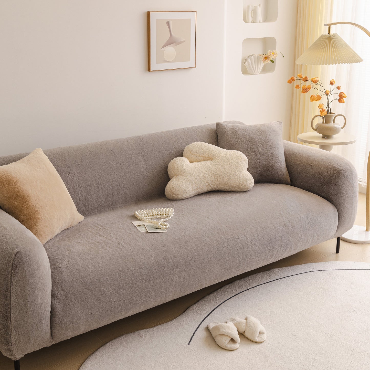 Soft Plush Warm Sofa Cover Stretchable Cozy Velvet Couch Protector for Fall & Winter on a stylish beige couch in a cozy living room.