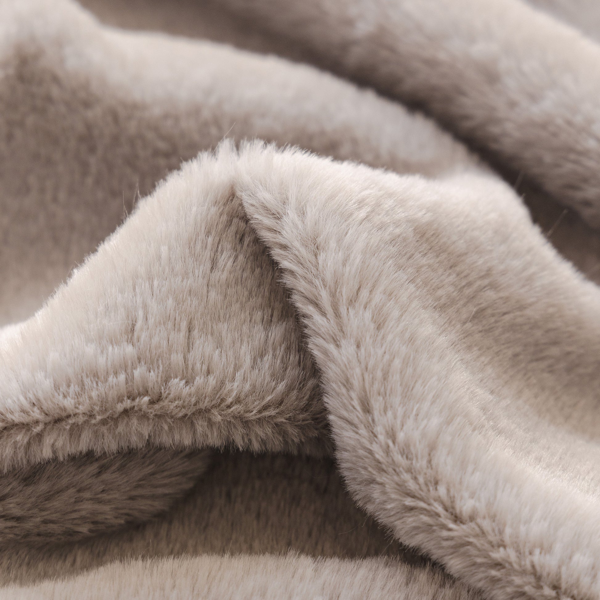 Close-up of Soft Plush Warm Sofa Cover Stretchable Cozy Velvet Couch Protector for Fall & Winter in beige color showing texture