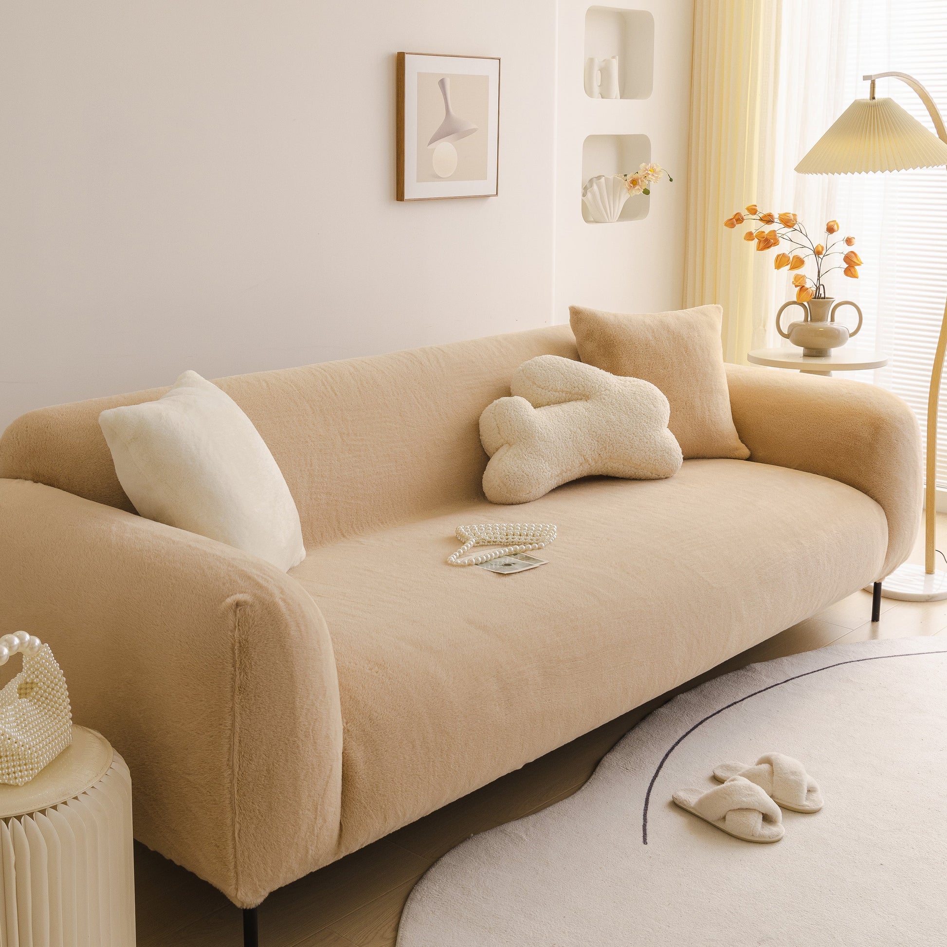 Soft Plush Warm Sofa Cover Stretchable Cozy Velvet Couch Protector for Fall & Winter on a modern beige couch in a cozy living room.