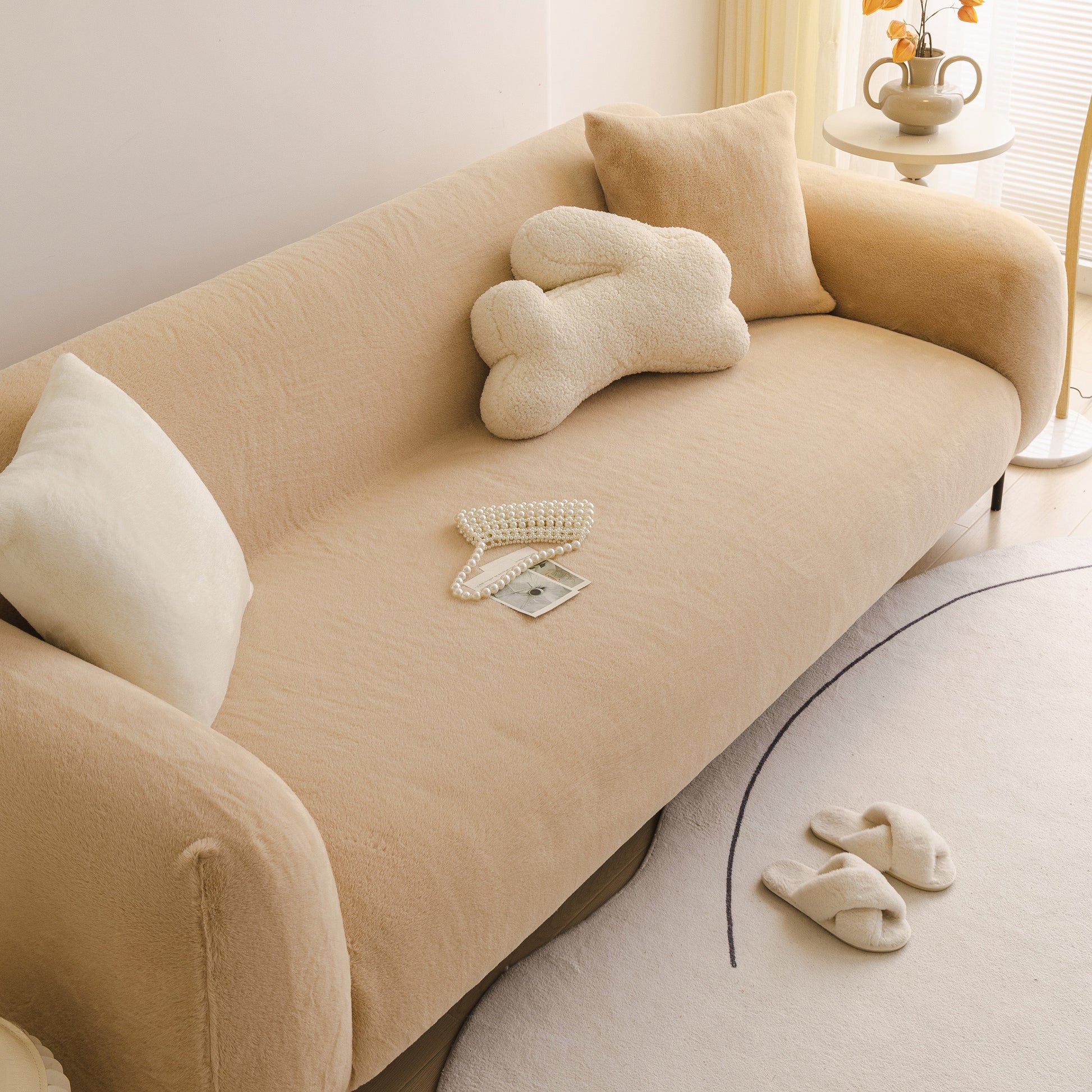 Soft Plush Warm Sofa Cover Stretchable Cozy Velvet Couch Protector for Fall & Winter on a stylish beige sofa.