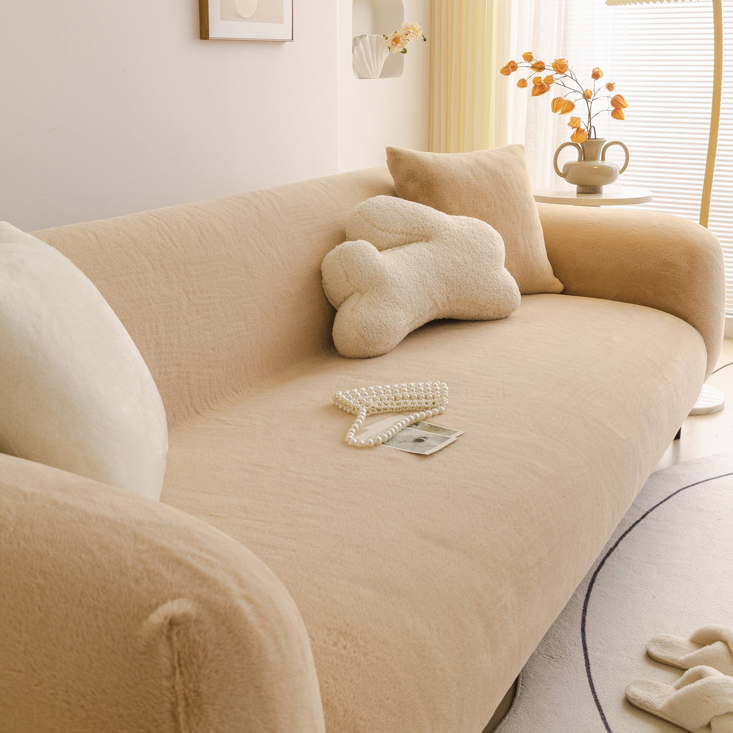 Soft Plush Warm Sofa Cover Stretchable Cozy Velvet Couch Protector for Fall & Winter on a beige couch in a cozy living room setting.