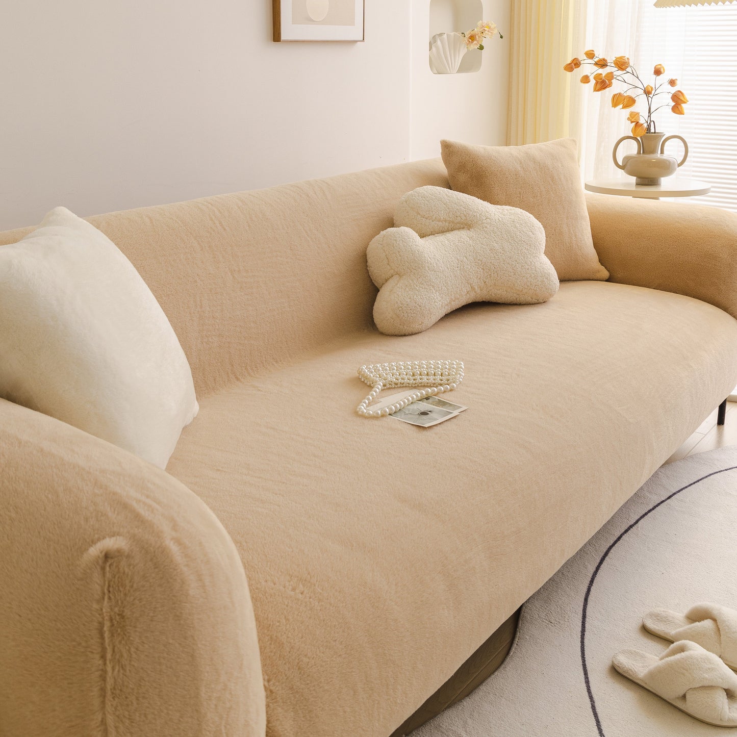 Soft Plush Warm Sofa Cover Stretchable Cozy Velvet Couch Protector for Fall & Winter on a beige couch with decorative pillows.
