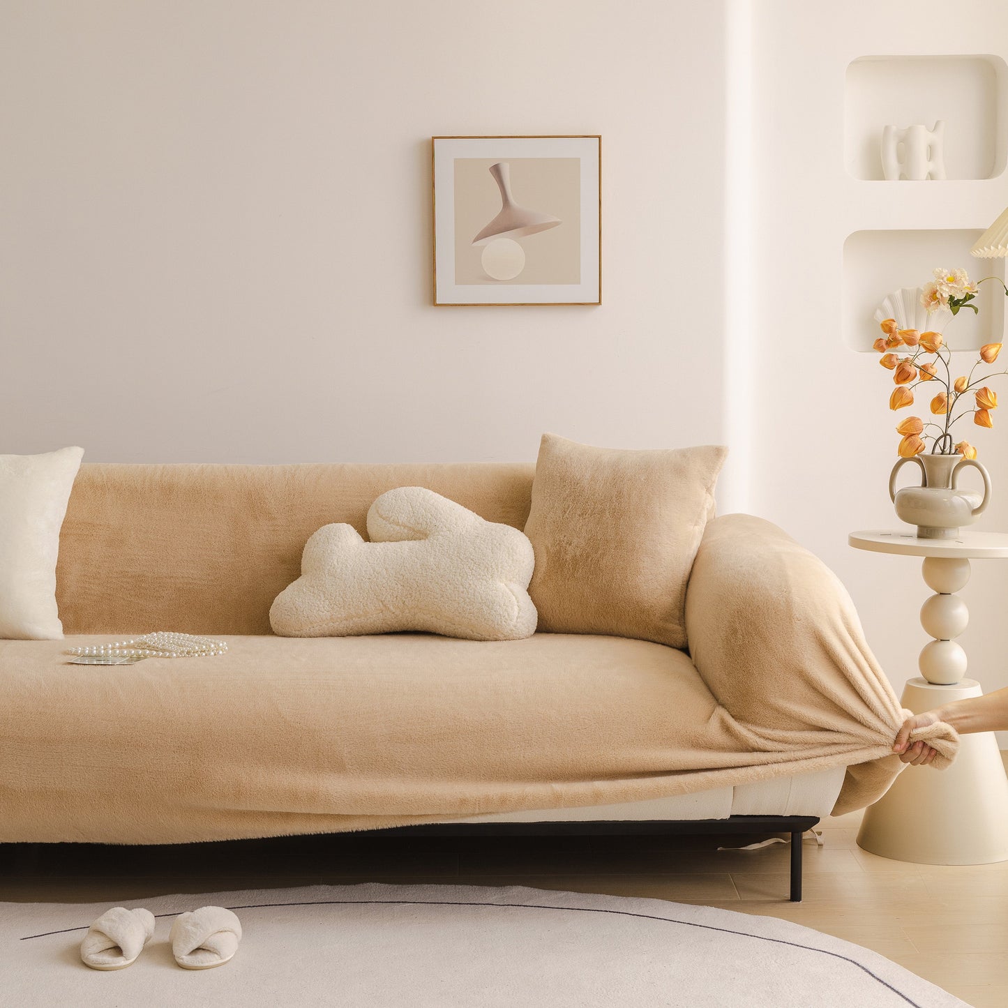 Soft Plush Warm Sofa Cover Stretchable Cozy Velvet Couch Protector for Fall & Winter, beige color on a modern sofa in a cozy living room.
