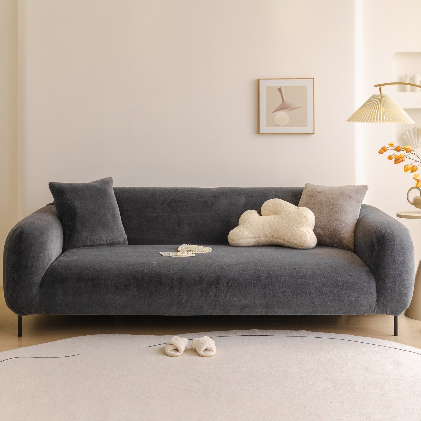 Soft Plush Warm Sofa Cover Stretchable Cozy Velvet Couch Protector for Fall & Winter on a dark gray sofa.