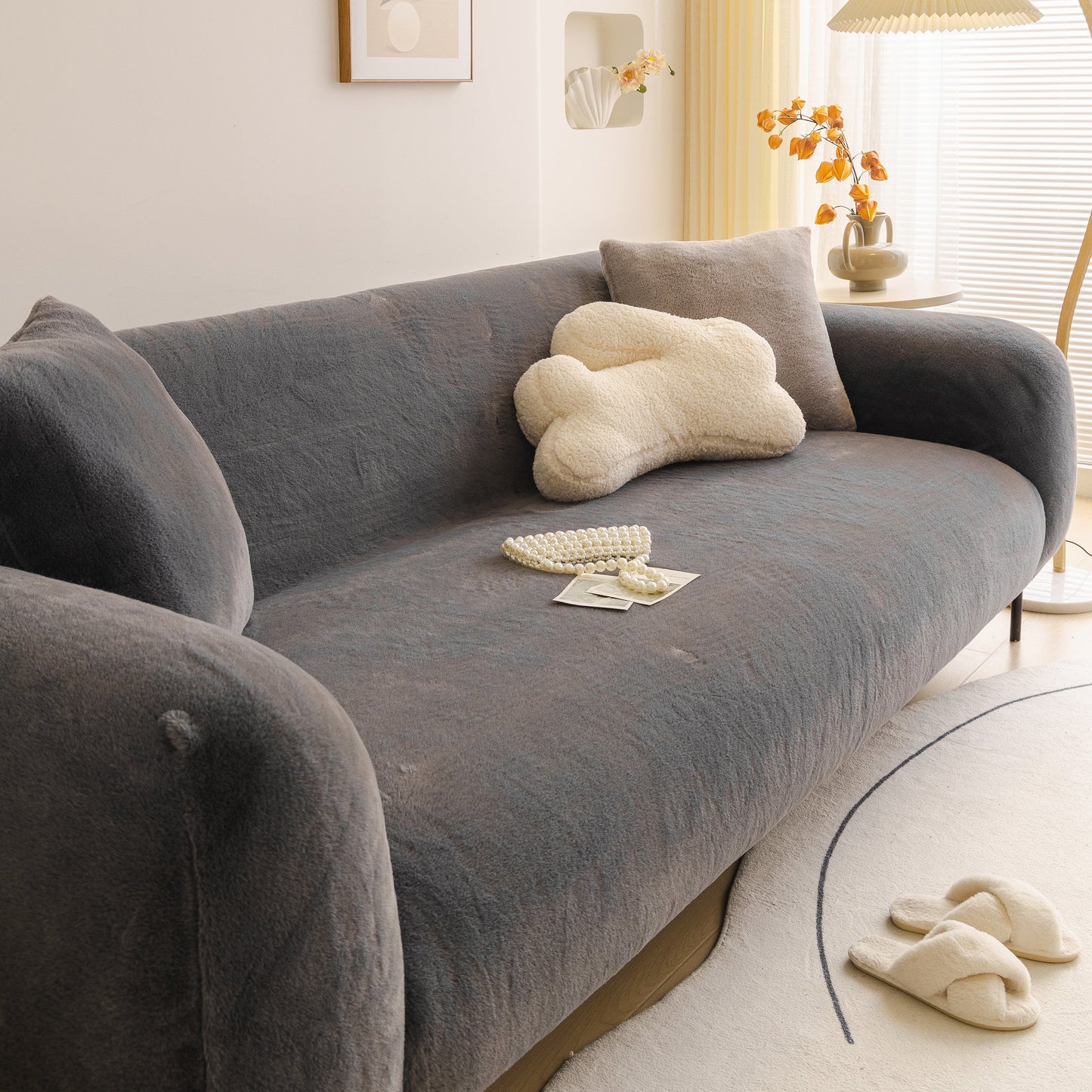 Soft Plush Warm Sofa Cover Stretchable Cozy Velvet Couch Protector for Fall & Winter on a modern grey sofa