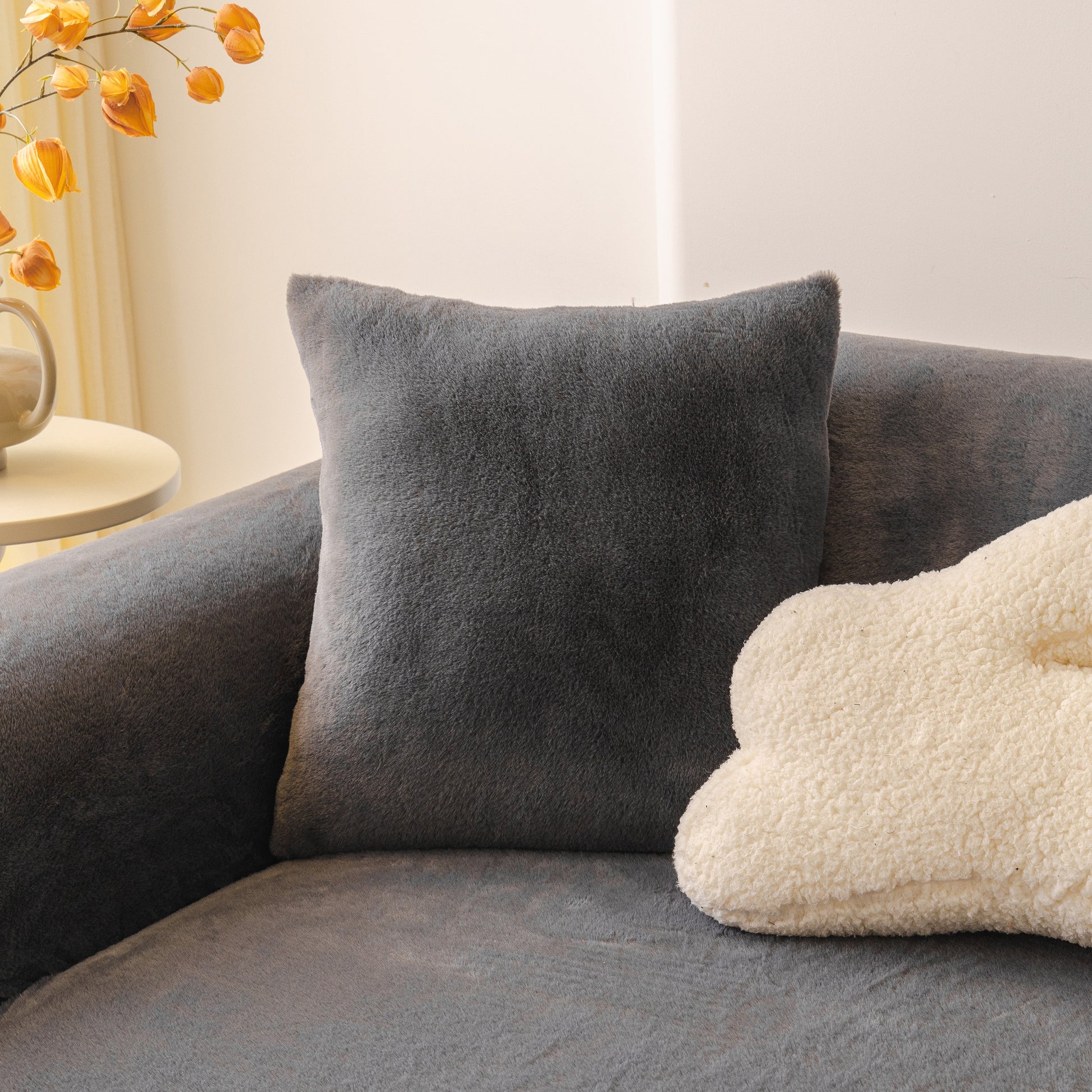 Soft Plush Warm Sofa Cover Stretchable Cozy Velvet Couch Protector for Fall & Winter shown on a couch with cushion and fall decor.