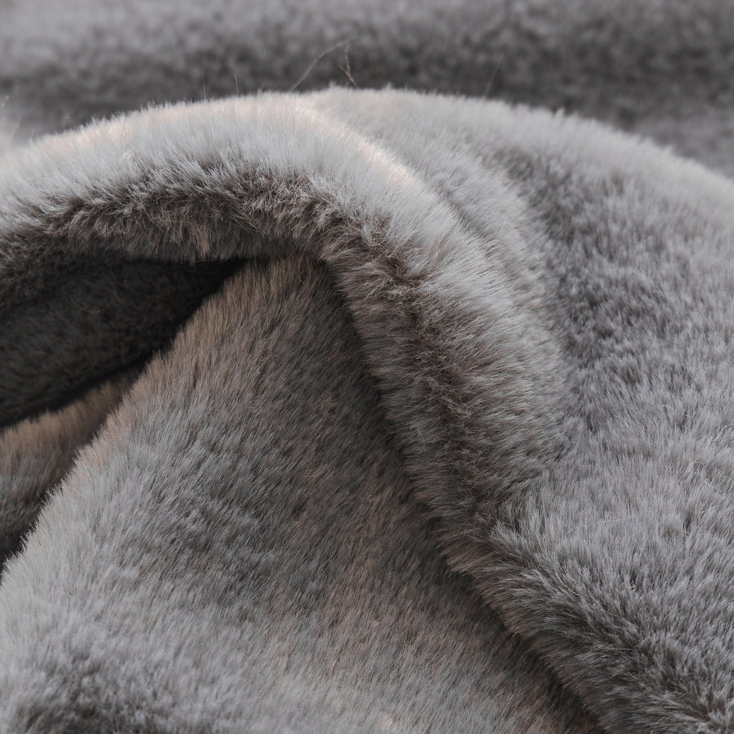 Soft Plush Warm Sofa Cover Stretchable Cozy Velvet Couch Protector for Fall & Winter in gray fabric close-up