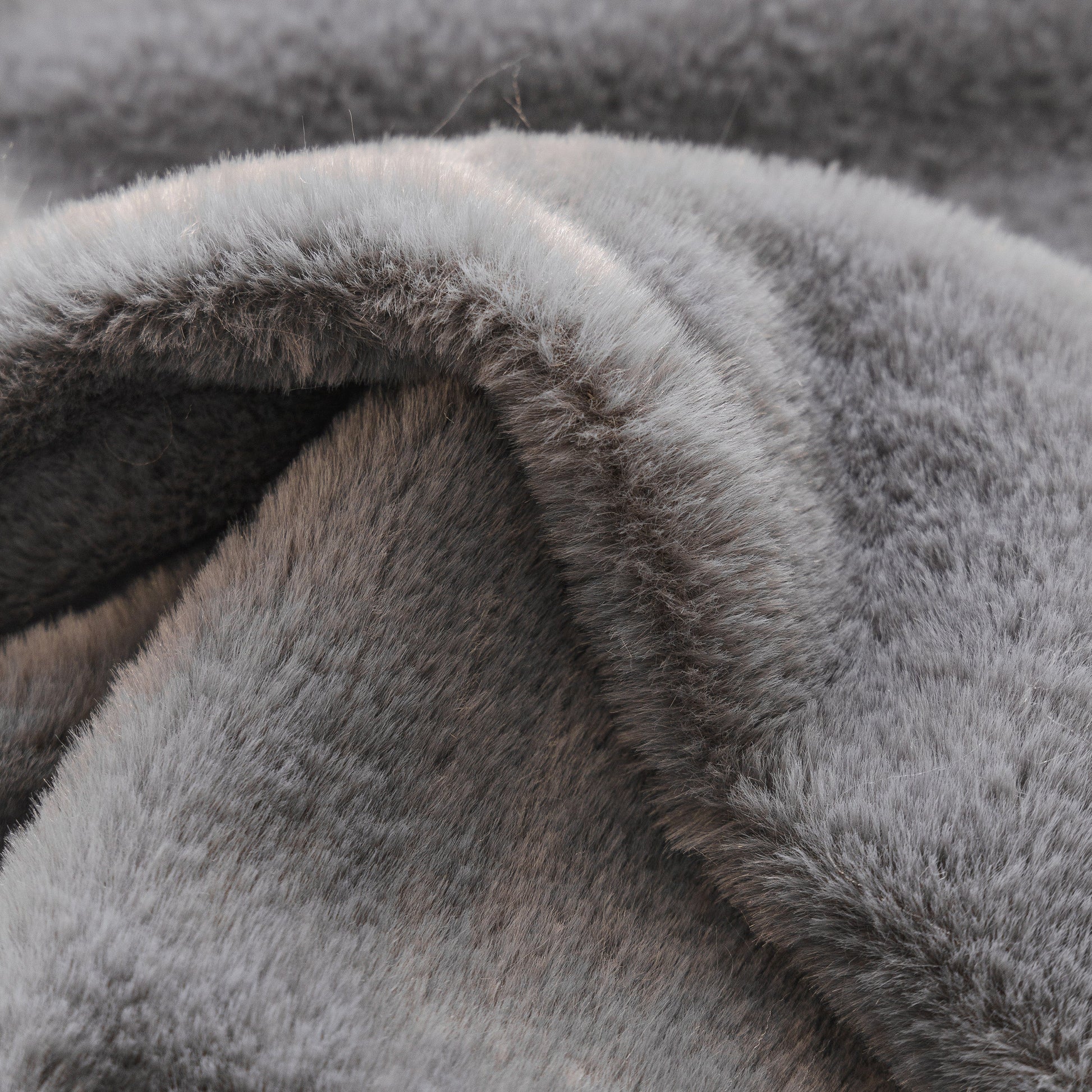 Soft Plush Warm Sofa Cover Stretchable Cozy Velvet Couch Protector for Fall & Winter in gray fabric close-up