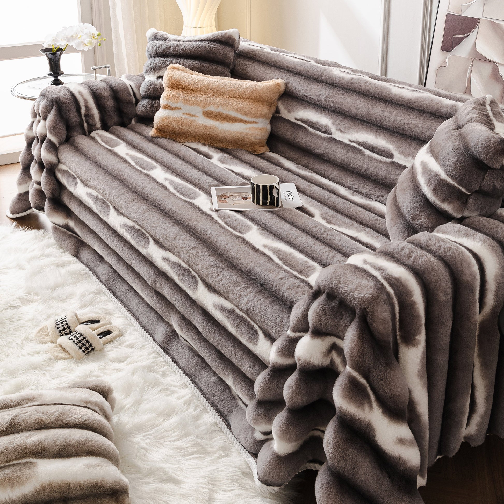 Ultra Soft Faux Fur Couch Cover – Large, Fluffy, and Elegant Sofa Throw Blanket on a stylish modern sofa