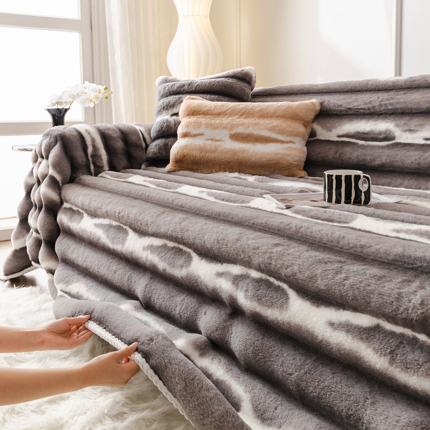 Ultra Soft Faux Fur Couch Cover – Large, Fluffy, and Elegant Sofa Throw Blanket on modern sofa enhancing decor.