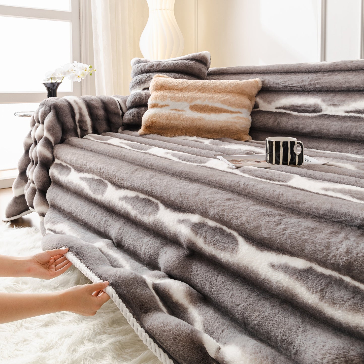 Ultra Soft Faux Fur Couch Cover – Large, Fluffy, and Elegant Sofa Throw Blanket displayed on a sofa with decorative pillows.