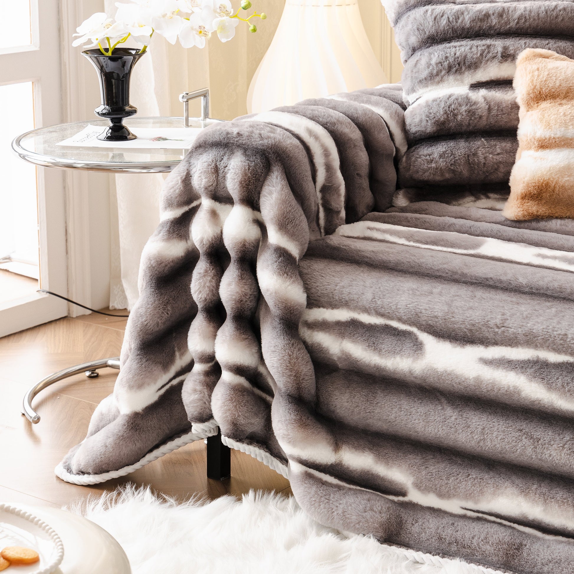 Ultra Soft Faux Fur Couch Cover – Large, Fluffy, and Elegant Sofa Throw Blanket draped over a stylish sofa in a cozy living room.