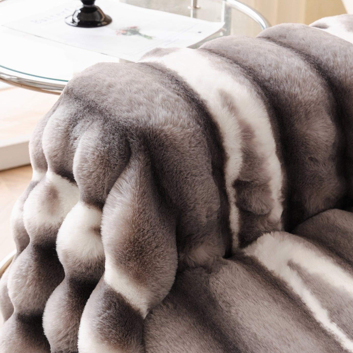 Ultra Soft Faux Fur Couch Cover – Large, Fluffy, and Elegant Sofa Throw Blanket with gradient design on a sofa.