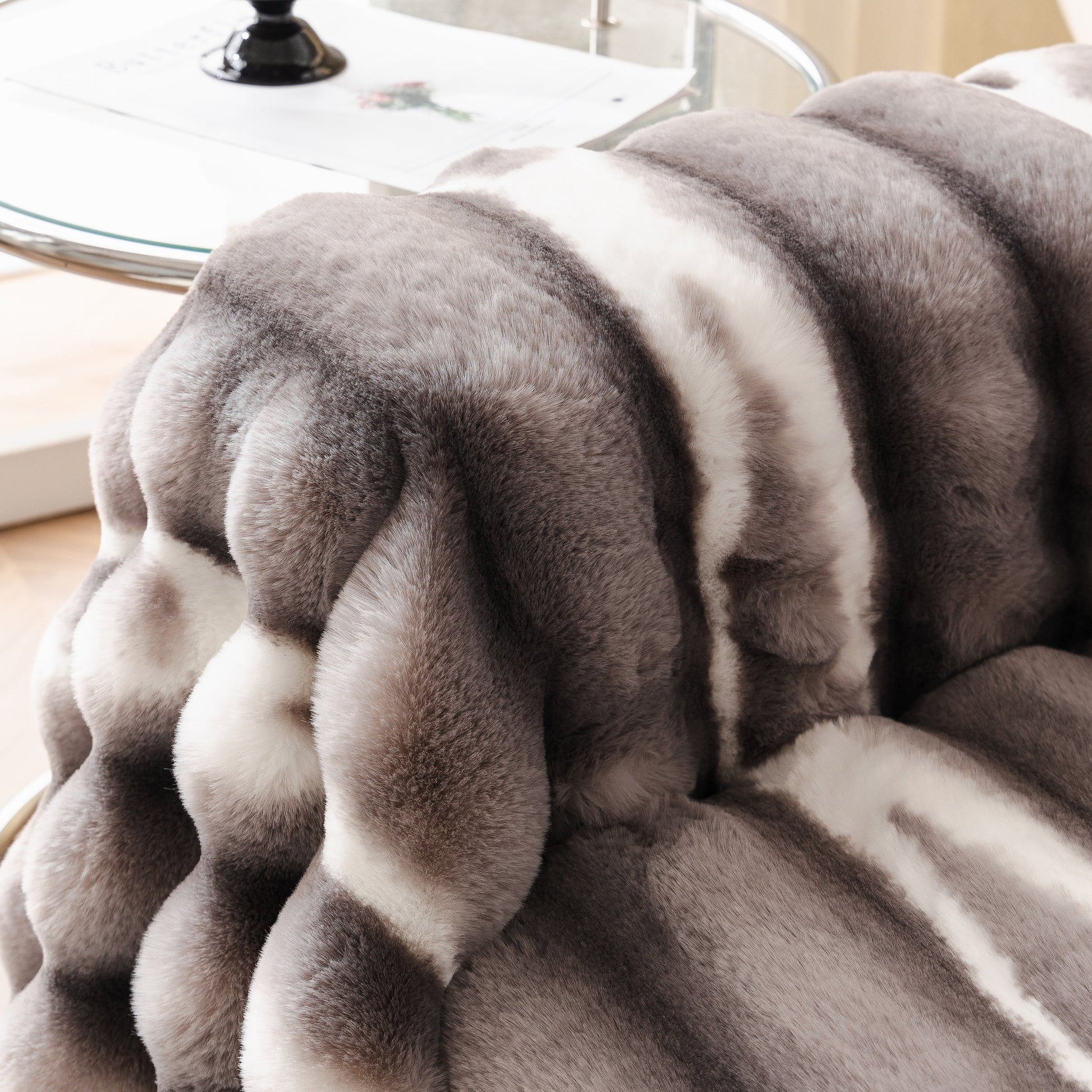 Ultra Soft Faux Fur Couch Cover – Large, Fluffy, and Elegant Sofa Throw Blanket with gradient design on a sofa.