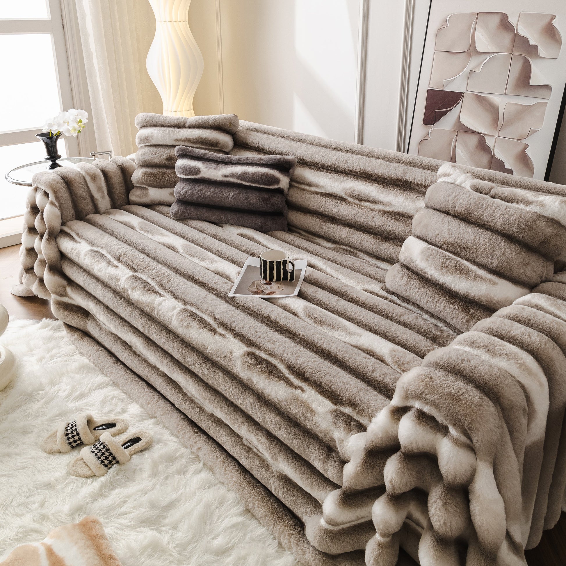 Ultra Soft Faux Fur Couch Cover – Large, Fluffy, and Elegant Sofa Throw Blanket adds luxury to a living room setting.