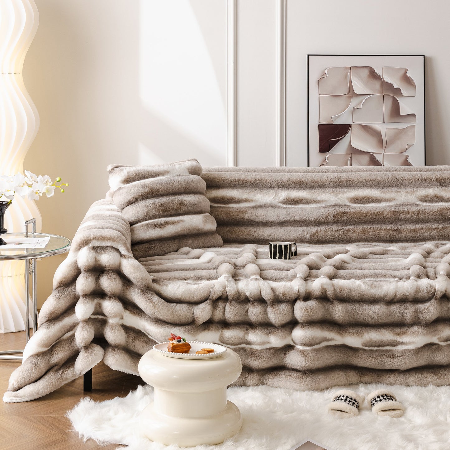 Ultra Soft Faux Fur Couch Cover – Large, Fluffy, and Elegant Sofa Throw Blanket drapes over a couch in a stylish living room setting.