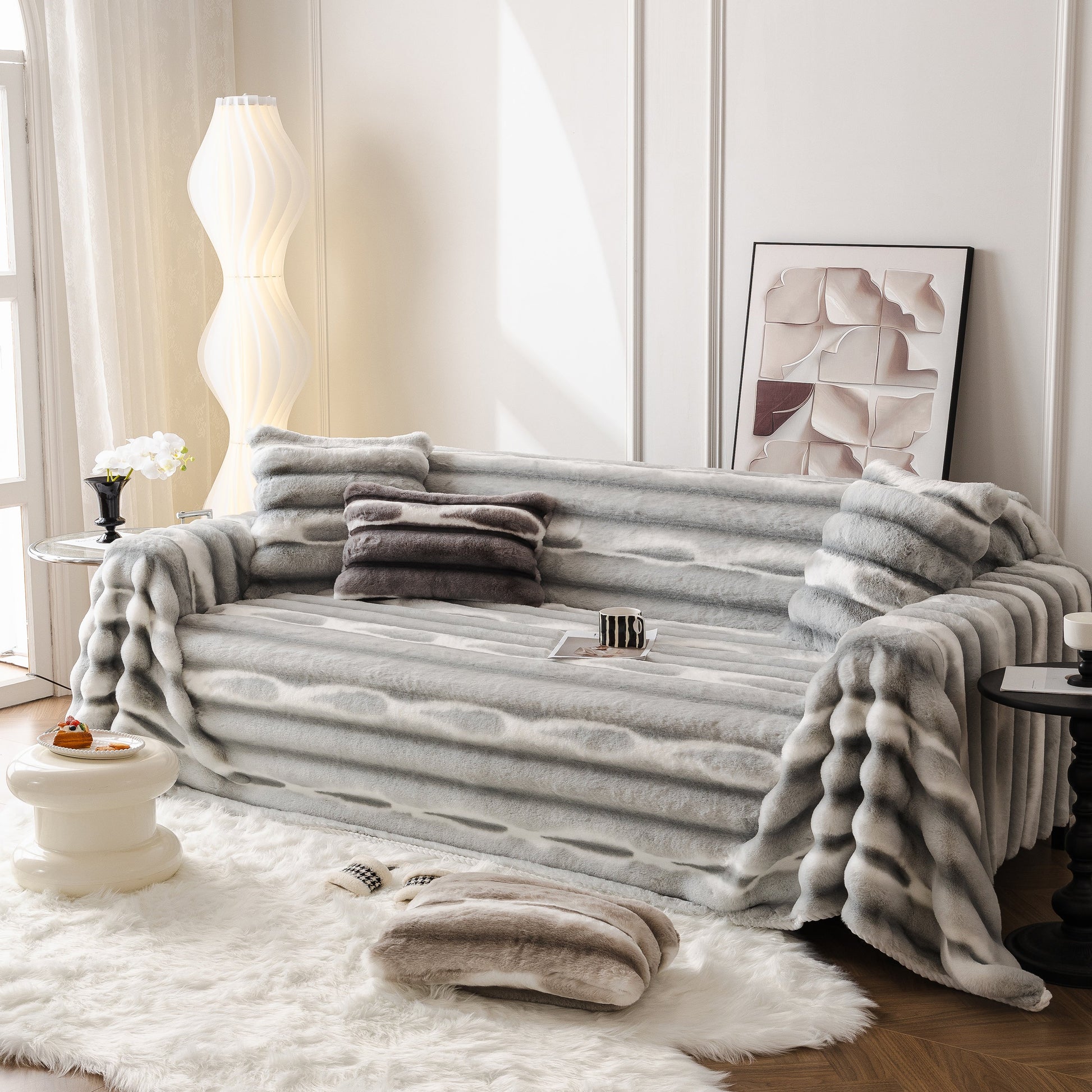 Ultra Soft Faux Fur Couch Cover – Large, Fluffy, and Elegant Sofa Throw Blanket draped over a stylish modern living room sofa.