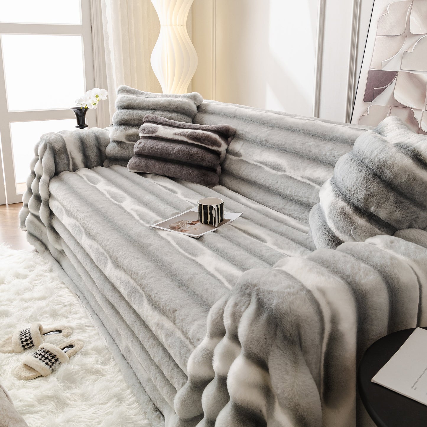 Luxurious living room with Ultra Soft Faux Fur Couch Cover – Large, Fluffy, and Elegant Sofa Throw Blanket in grey gradient on a cozy sofa.