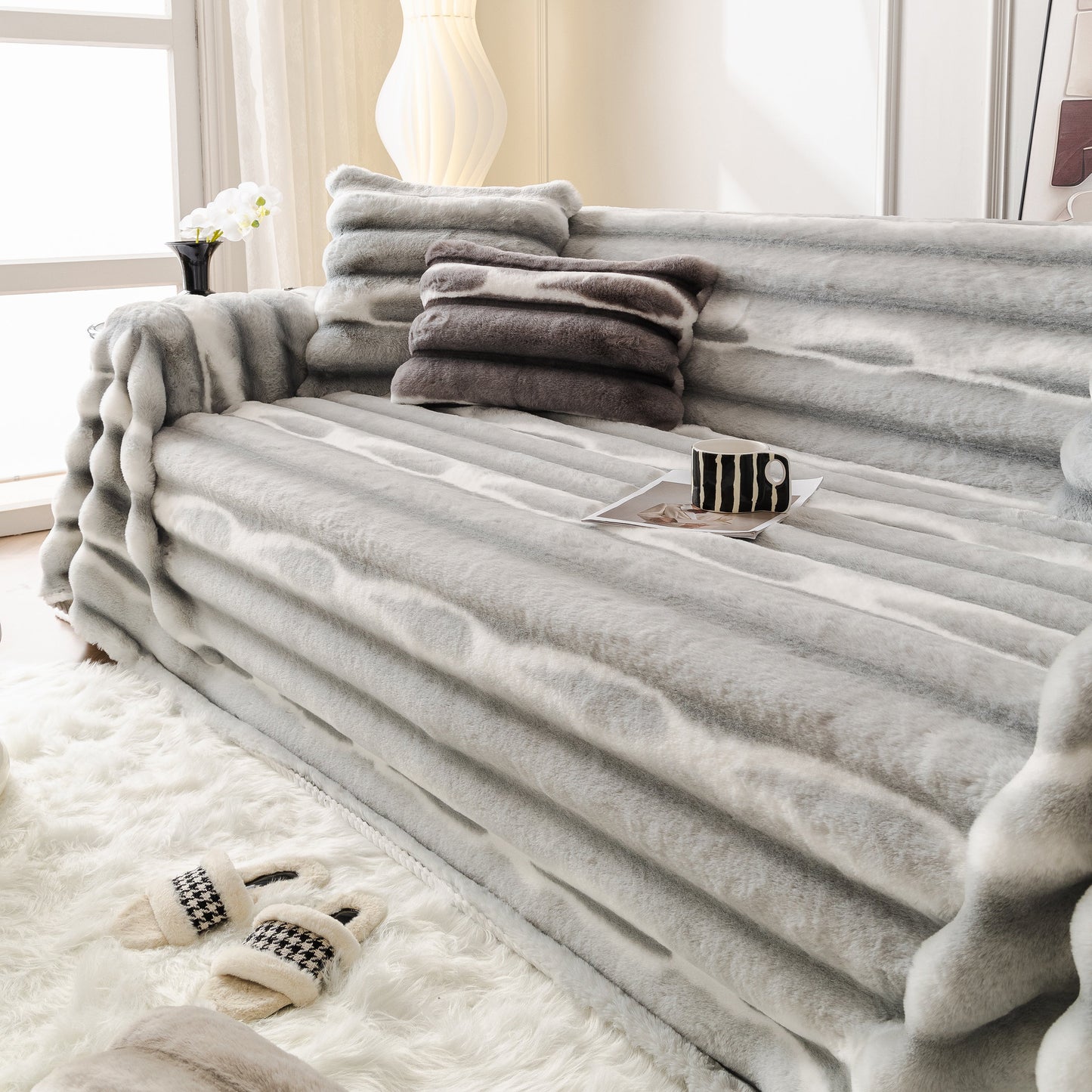 Ultra Soft Faux Fur Couch Cover – Large, Fluffy, and Elegant Sofa Throw Blanket on a modern sofa in a cozy living room.