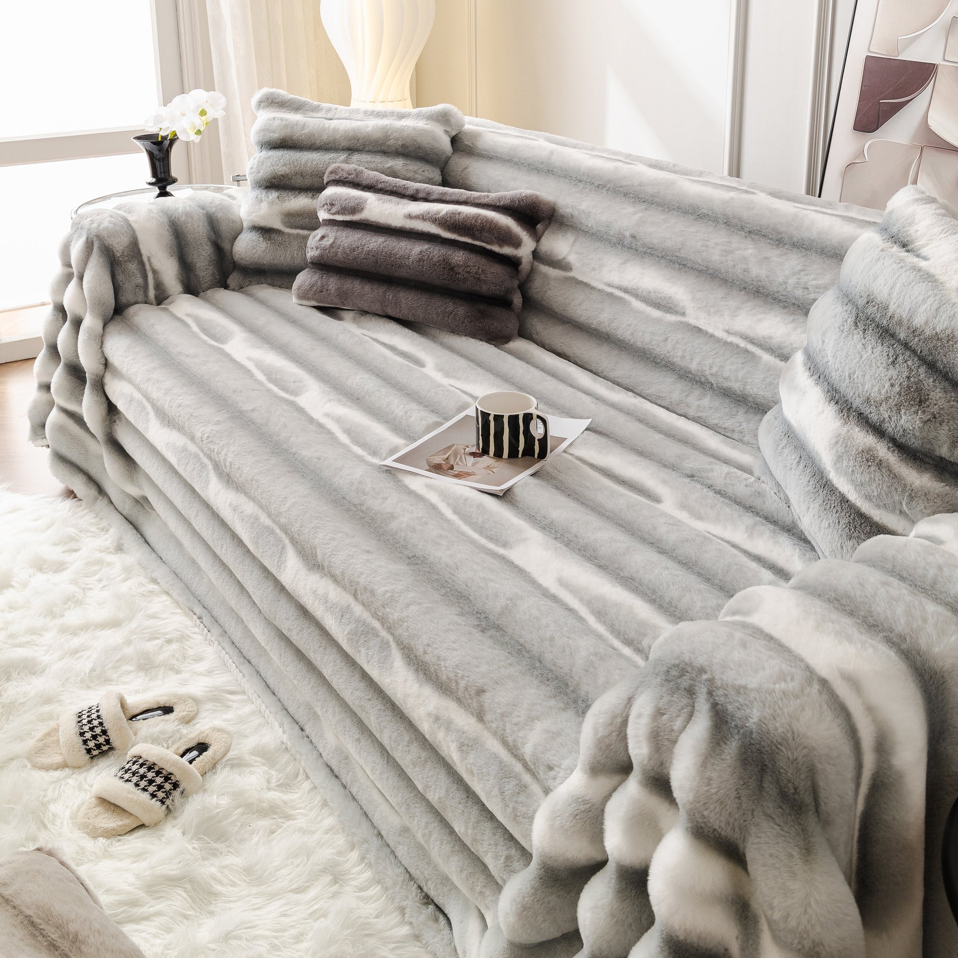 Ultra Soft Faux Fur Couch Cover – Large, Fluffy, and Elegant Sofa Throw Blanket on a modern sofa in a cozy living room.
