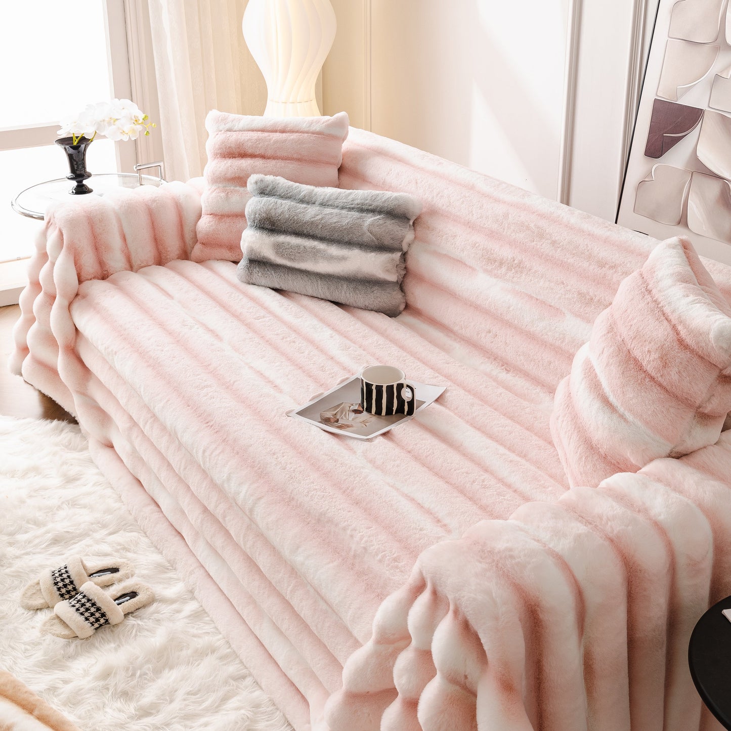 Ultra Soft Faux Fur Couch Cover – Large, Fluffy, and Elegant Sofa Throw Blanket draped over pink sofa in living room