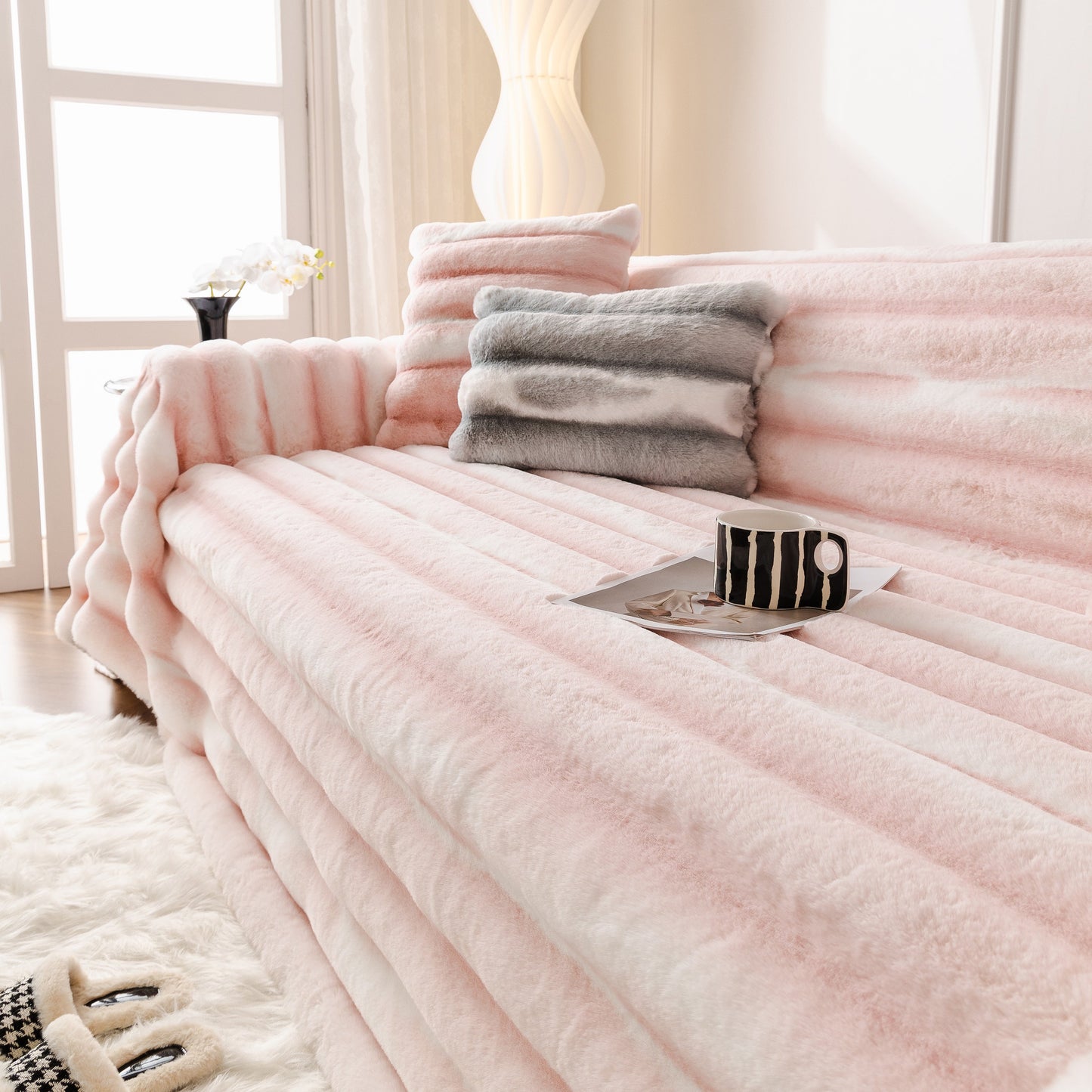 Ultra Soft Faux Fur Couch Cover – Large, Fluffy, and Elegant Sofa Throw Blanket enhancing a stylish pink sofa setting.