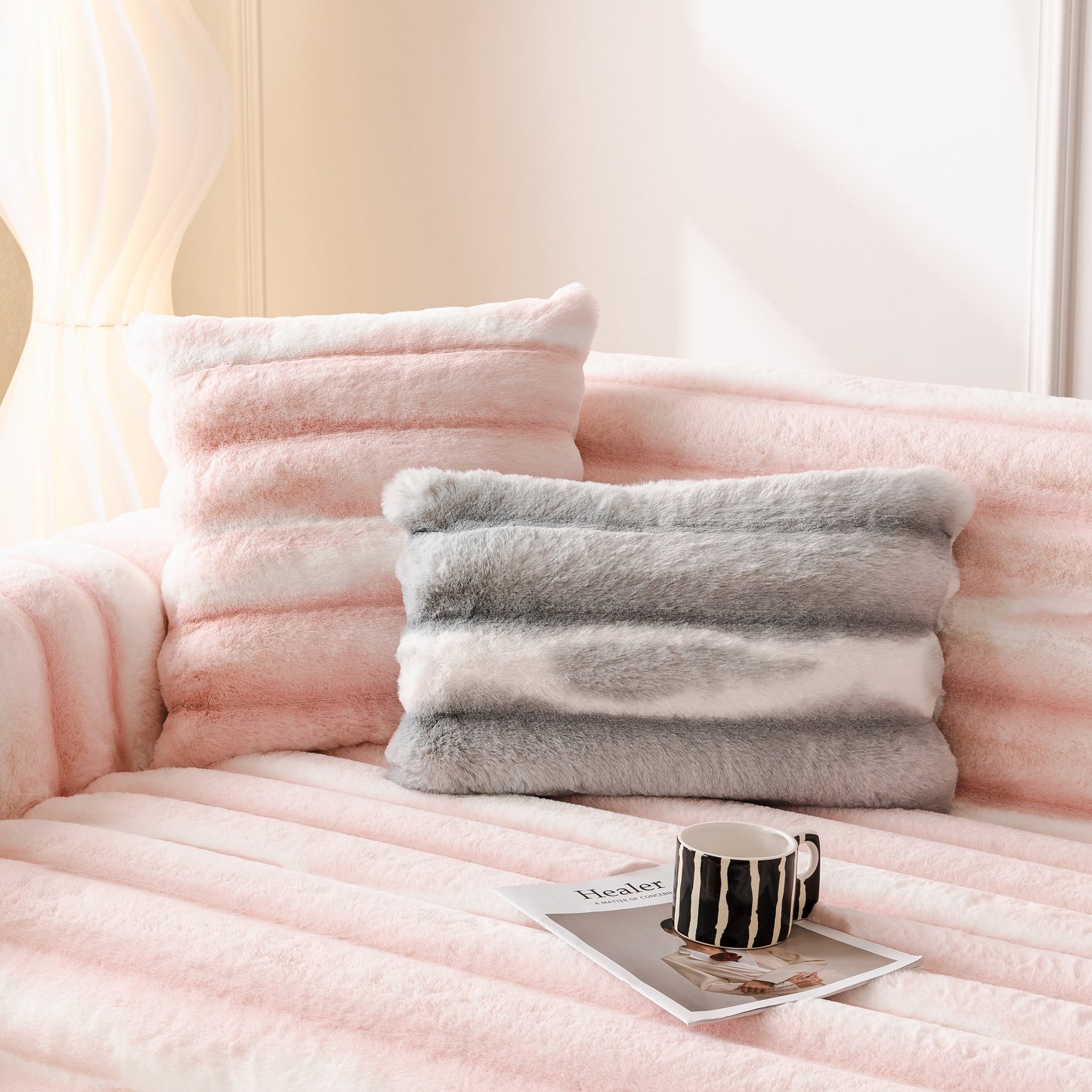 Ultra Soft Faux Fur Couch Cover – Large, Fluffy, and Elegant Sofa Throw Blanket on a couch with pillows