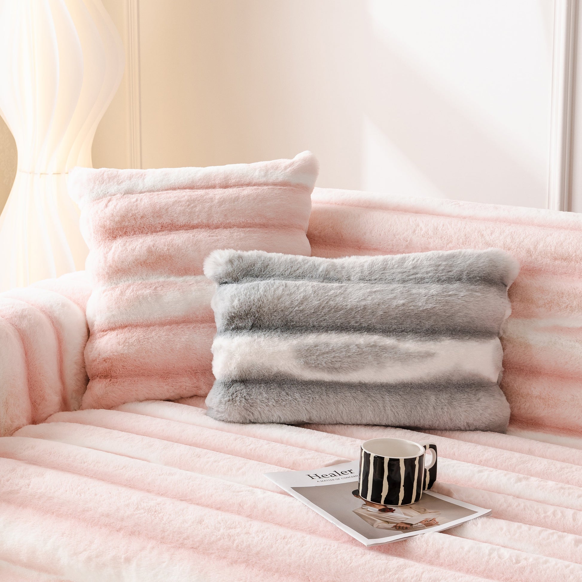 Ultra Soft Faux Fur Couch Cover – Large, Fluffy, and Elegant Sofa Throw Blanket on a couch with pillows