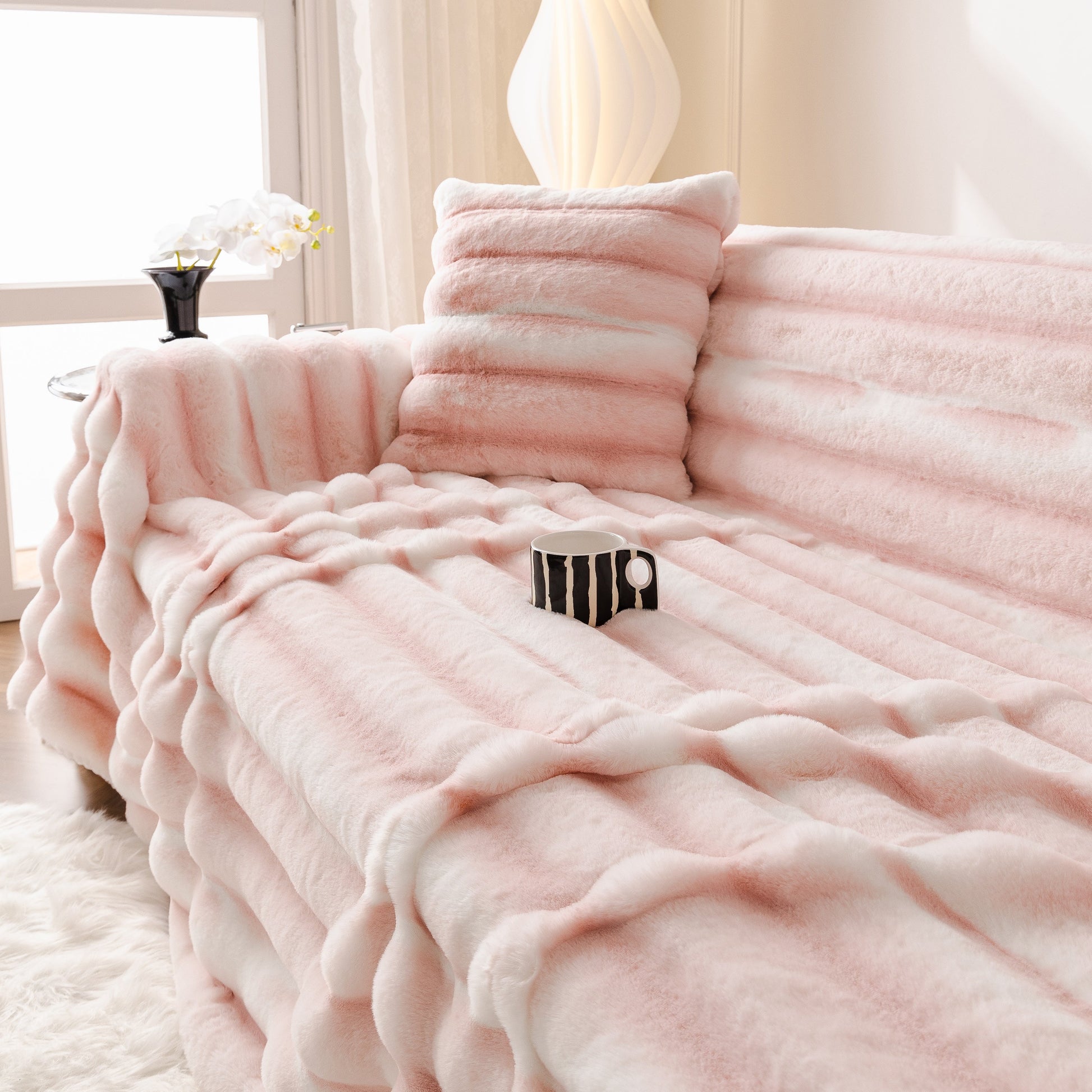 Ultra Soft Faux Fur Couch Cover – Large, Fluffy, and Elegant Sofa Throw Blanket on a sofa with decorative pillows