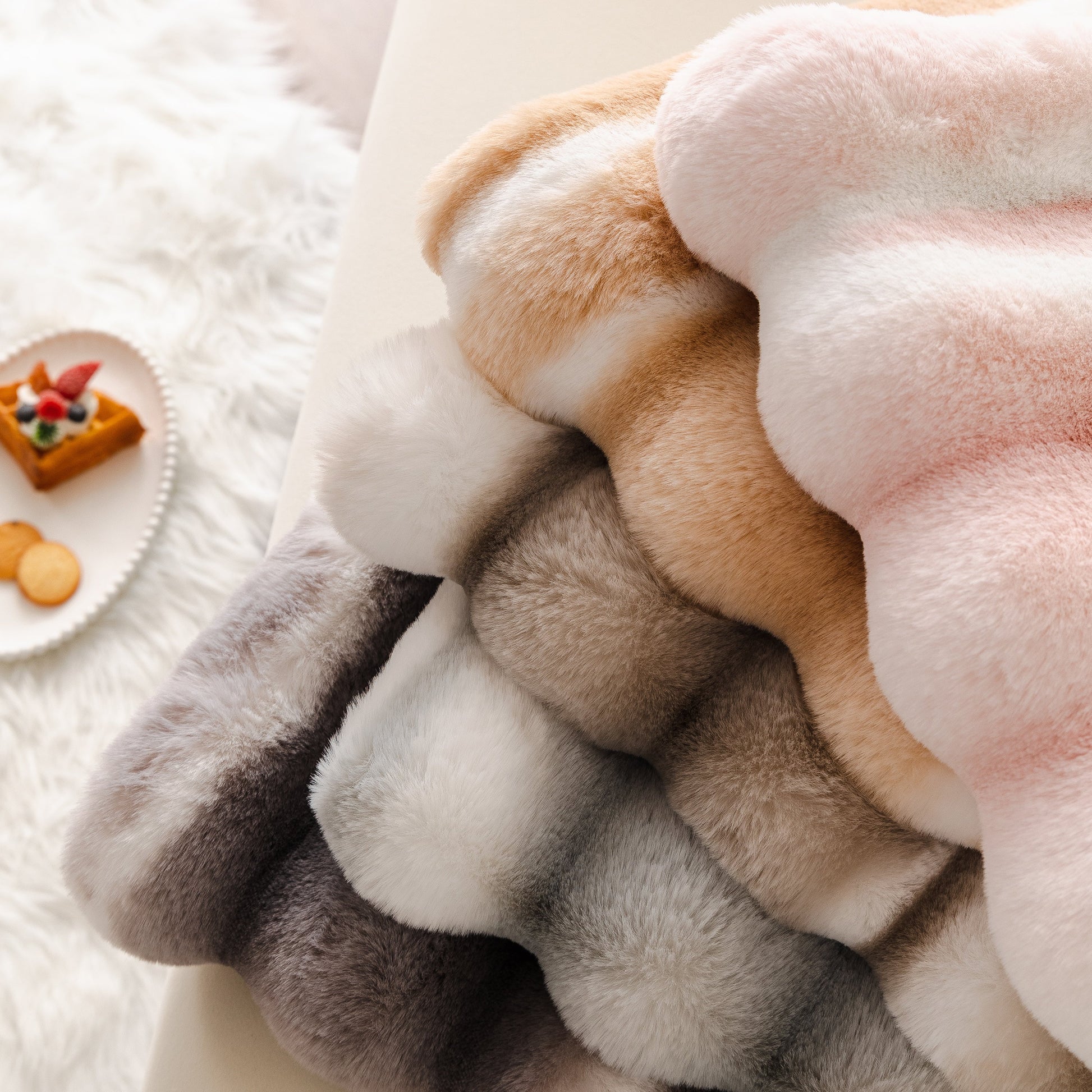 Ultra Soft Faux Fur Couch Cover – Large, Fluffy, and Elegant Sofa Throw Blanket in gradient colors displayed on sofa.