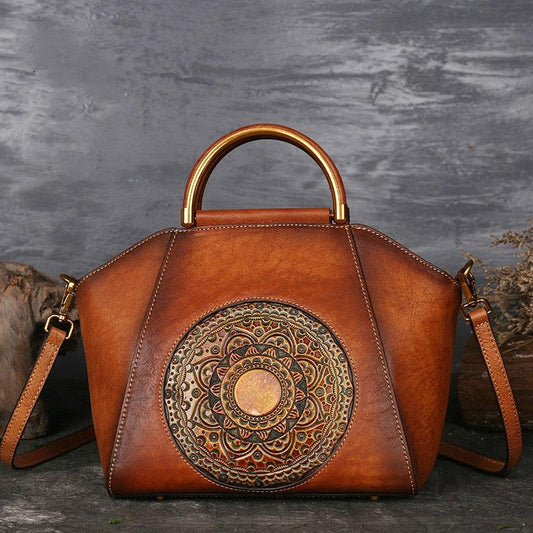 Mandala Embossed Leather Shoulder Bag with intricate mandala design, handcrafted cowhide tooled leather, and leather-wrapped handle.