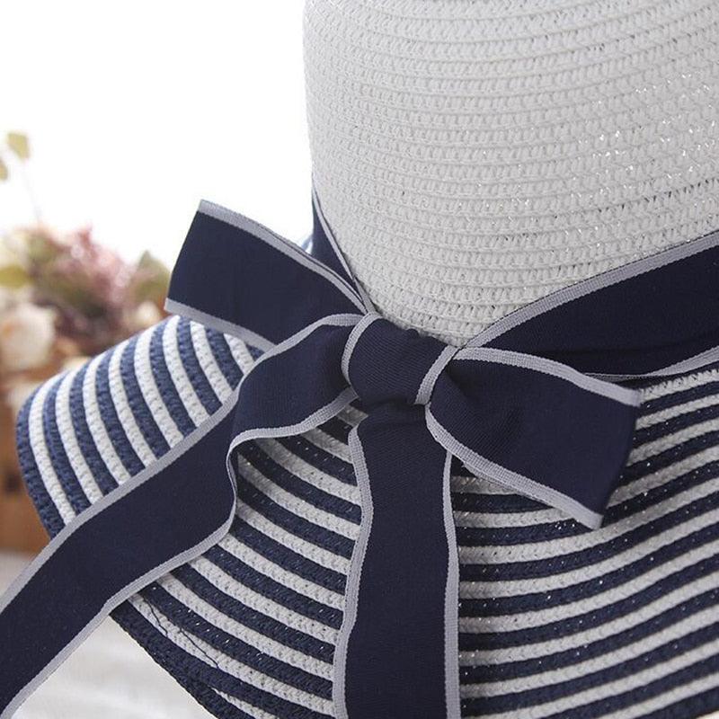 Audrey Hepburn Inspired Sun Hat – Elegant and Stylish for Cowgirl Women with black-and-white stripes and ribbon bow.