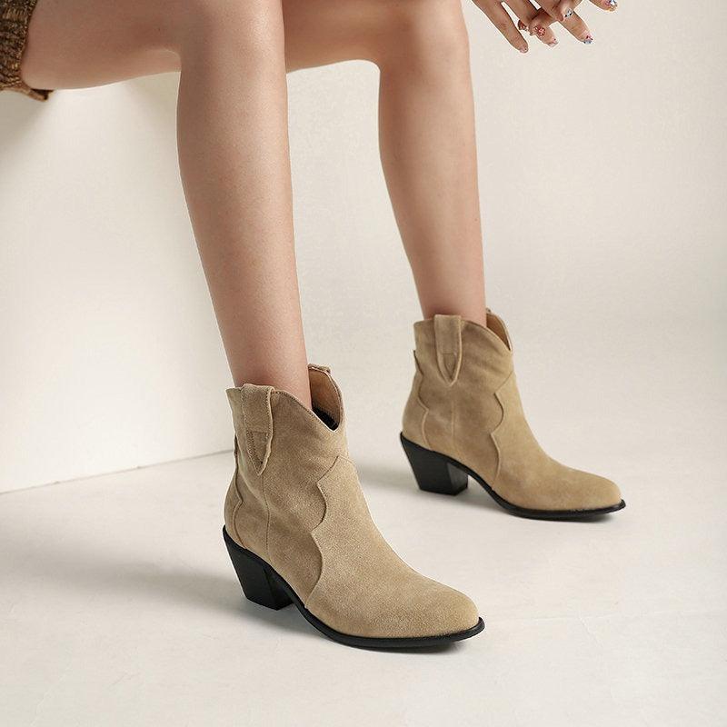 Cowgirl Chic Suede Ankle Boots - Stylish High Heel Cowgirl Boots for Women in beige with thick heel and round toe design.