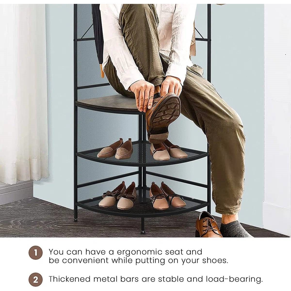 Person sitting on Modern Corner Entryway Hall Tree Shoe Storage Bench Coat Rack with shoes stored and coat hooks visible.