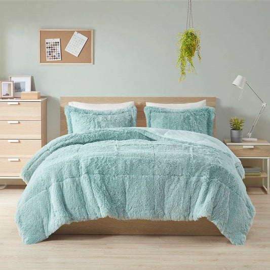 Full/Queen Soft Sherpa Faux Fur 3-Piece Comforter Set in Light Teal Blue displayed on bed in modern bedroom