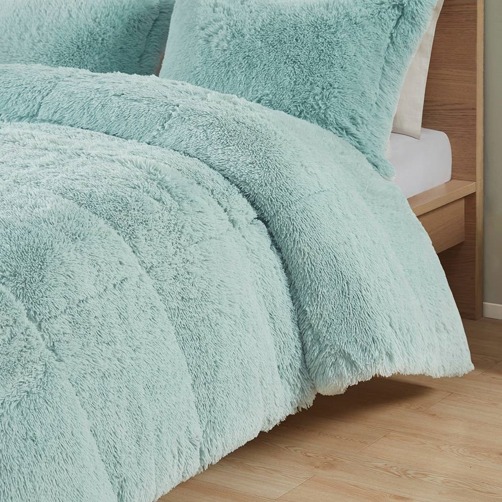 Twin/Twin XL Soft Sherpa Faux Fur 2-Piece Comforter Set in Light Teal Blue on bed