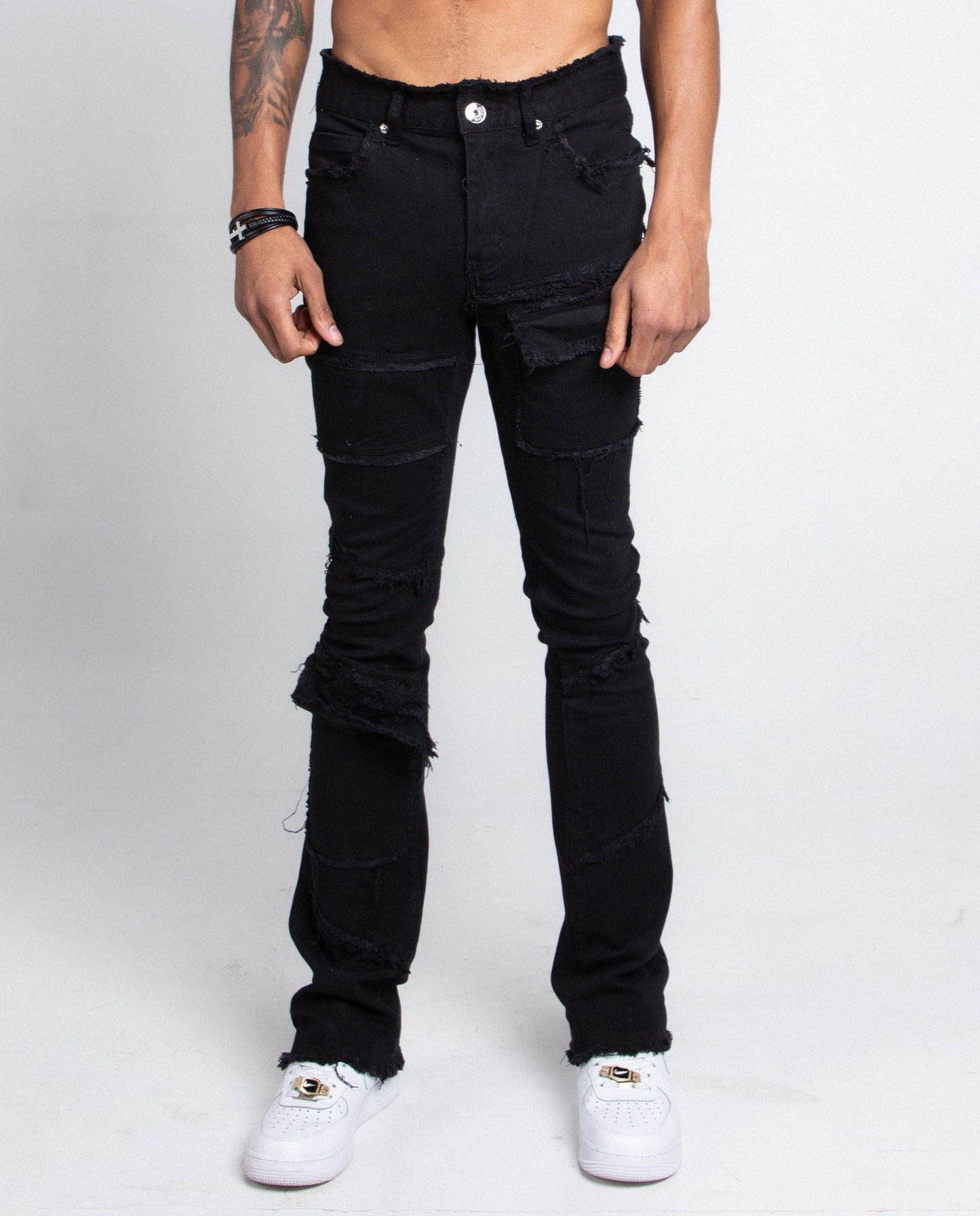 AS405 BLACK DISTRESSED STACKED JEANS with purple lace screen print and grey wash featuring mid-rise waist, stretchy fabric, five-pocket design.