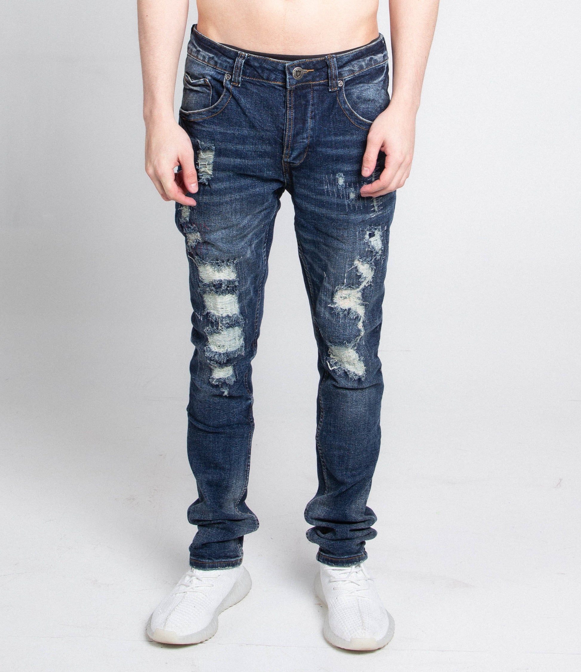 A403 SMALL RIPPED MID-RISE SKINNY JEANS with stretchy fabric featuring ripped slim leg, five pockets, zipper fly, and belt loops.