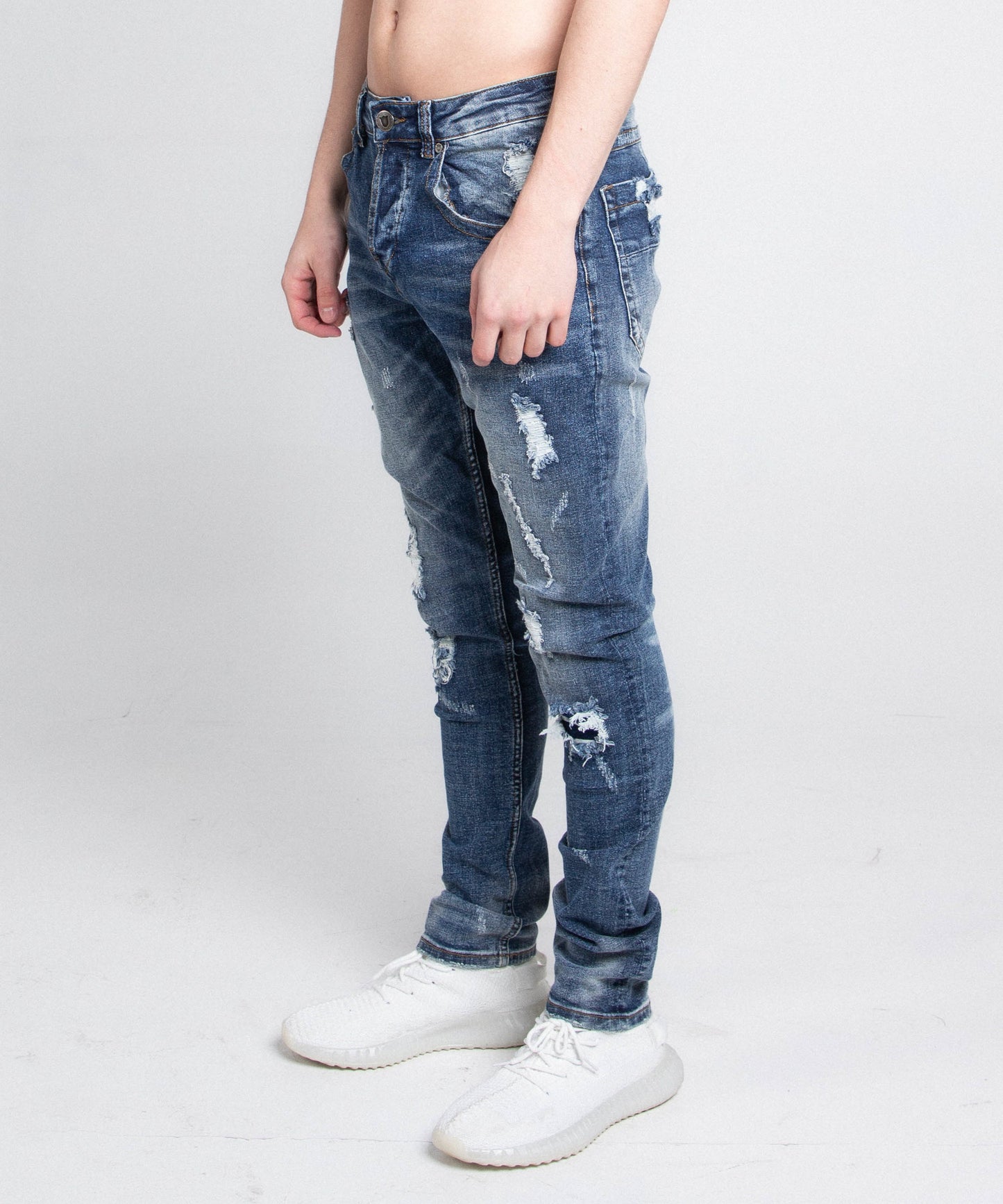 A406 CASUAL DISTRESSED SKINNY JEANS, stretchy mid-rise with five pockets, belt loops, and zipper fly, made from cotton fabric.