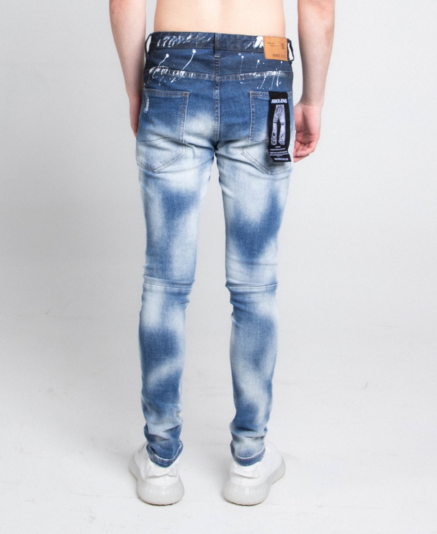Back view of A404 CASUAL FADED WASH SKINNY JEANS with five pockets and stretchy fabric.