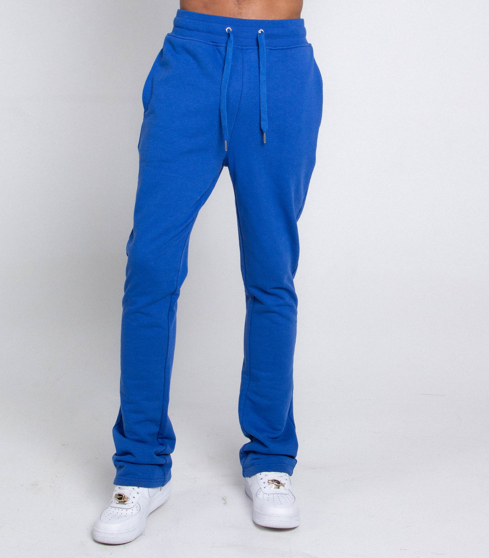 M5690-AJSKP MULTI-COLOR STACKED SWEATPANTS with elastic waistband and drawstrings, featuring back and side pockets.