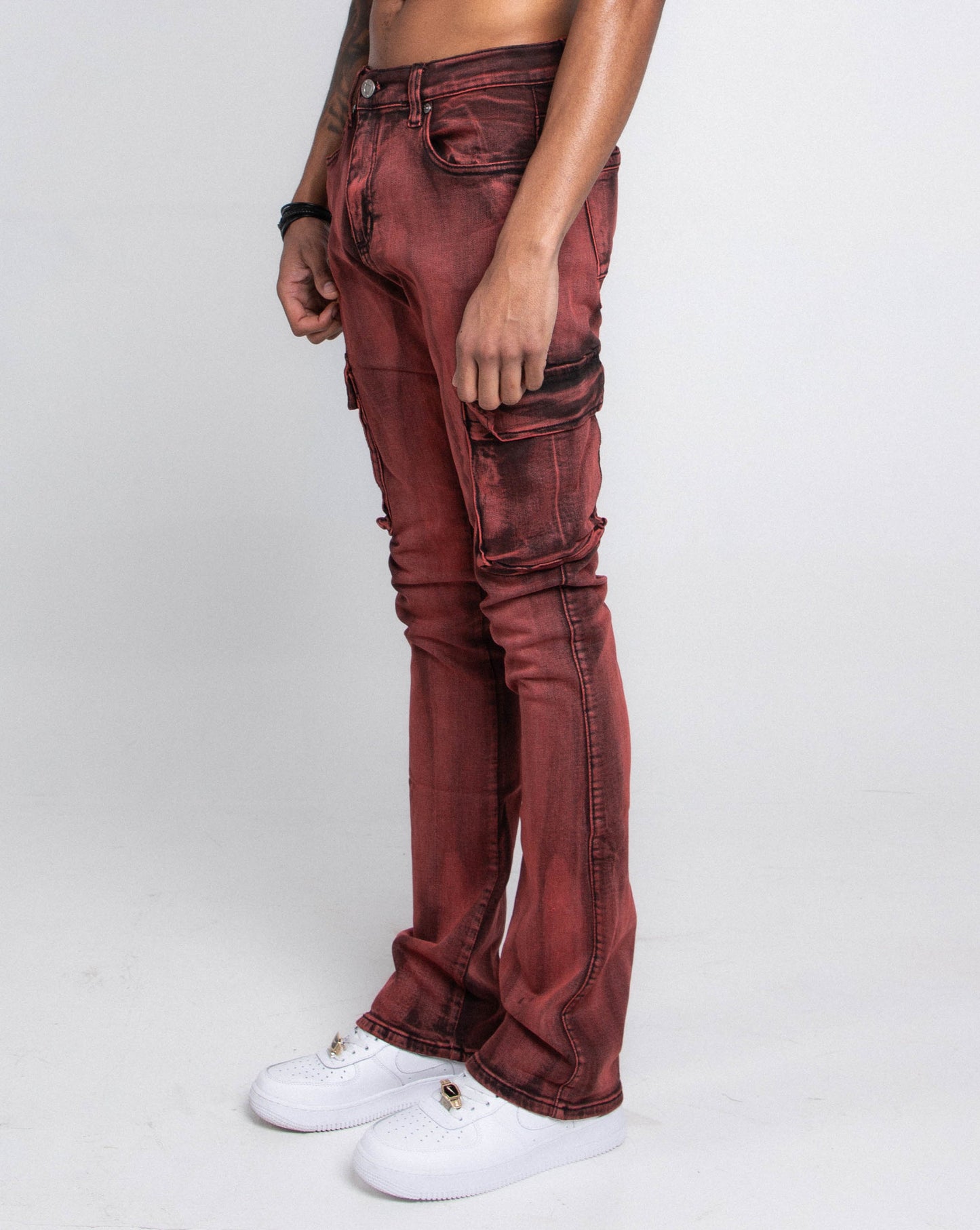 Side view of AJ29SK GREY/WHITE WASH STACKED CARGO JEANS, featuring mid-rise waist, stretchy fabric, paint splash design, and cargo pockets.