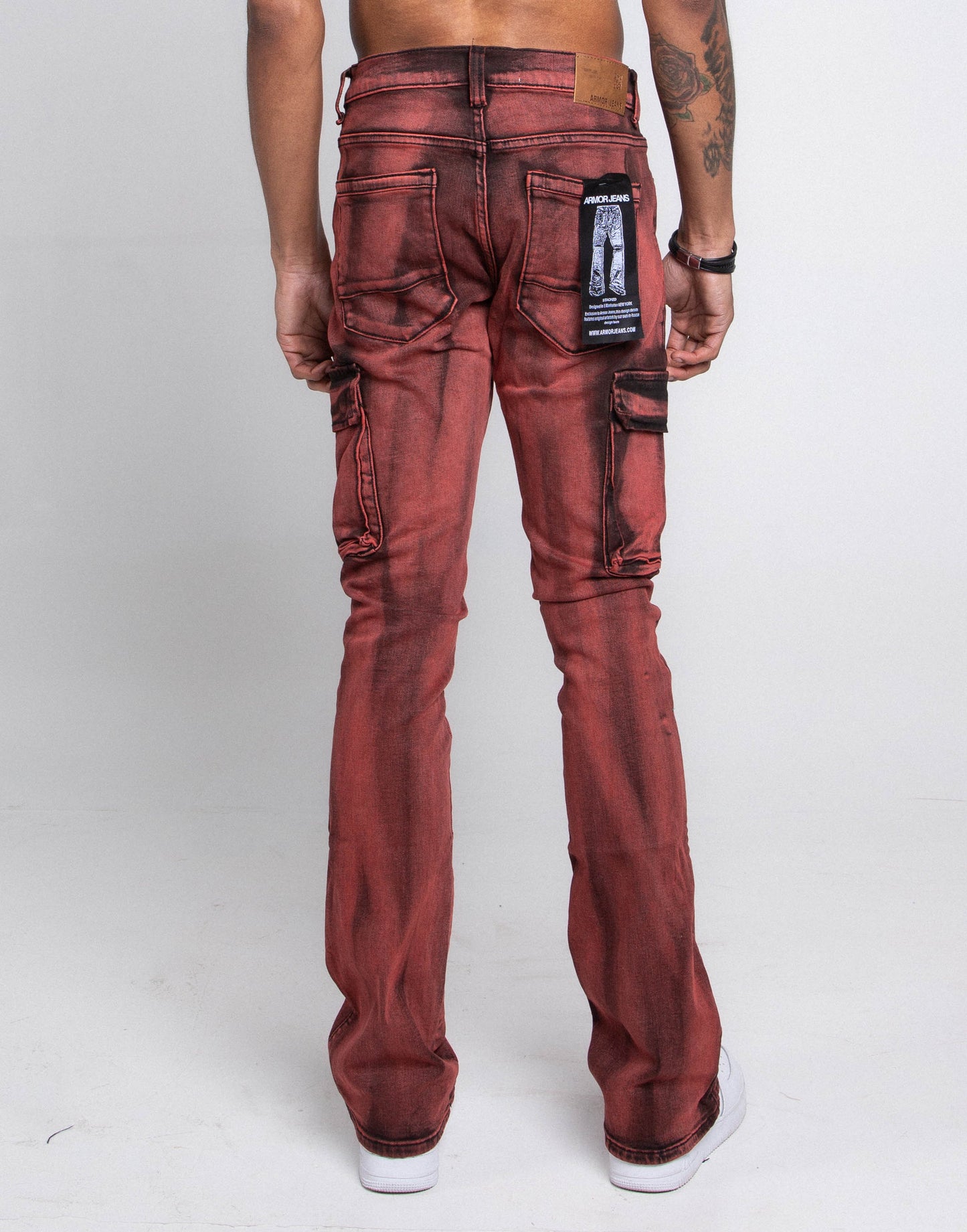 Back view of red wash stacked cargo jeans with cargo pockets and stretch fabric