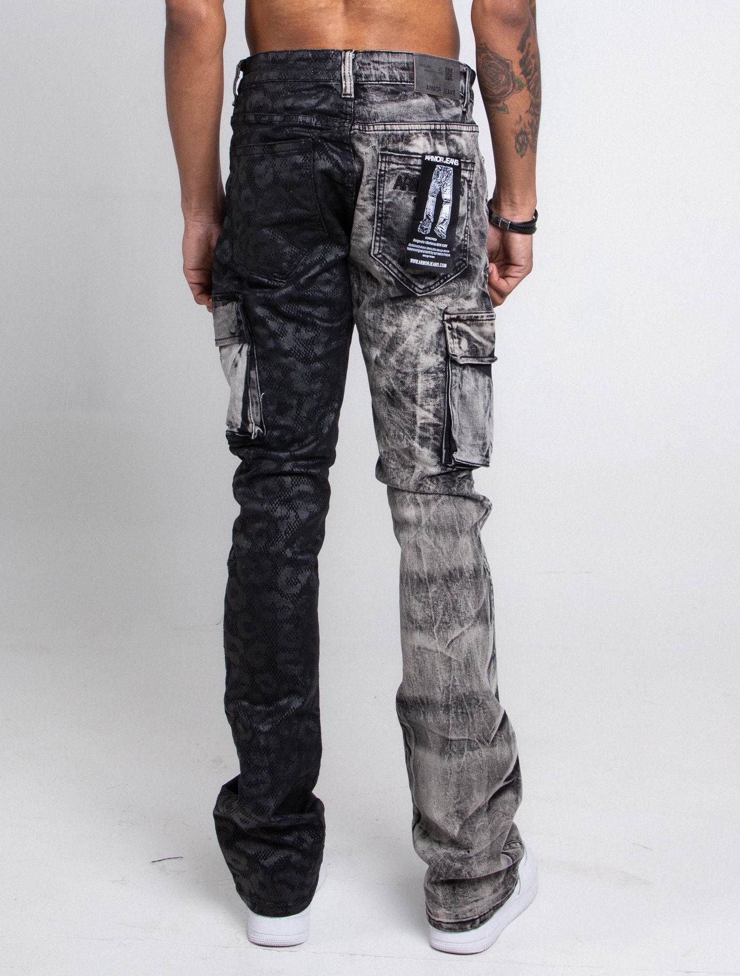 AJ33SK-2 BLACK LACE STACKED JEANS with purple lace print, grey wash, five-pocket design, and stretchy fabric.