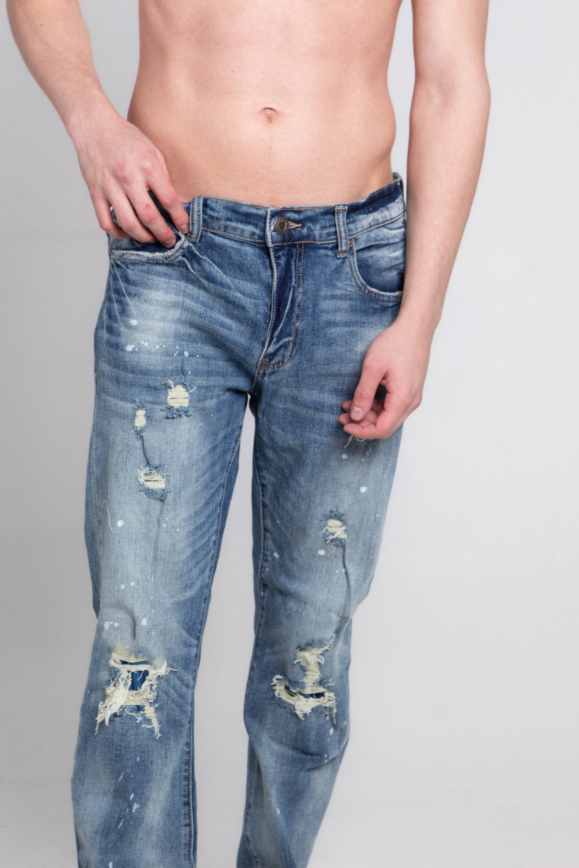 AJ05C CASUAL SKINNY DISTRESSED JEANS with mid rise waist and stretchy fabric, featuring five pockets, belt loops, and distressed detailing.